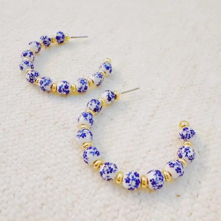 Blue Bloom Floral Hoop Earrings – Elegant Hoops with Soft Blue Flower Accents
