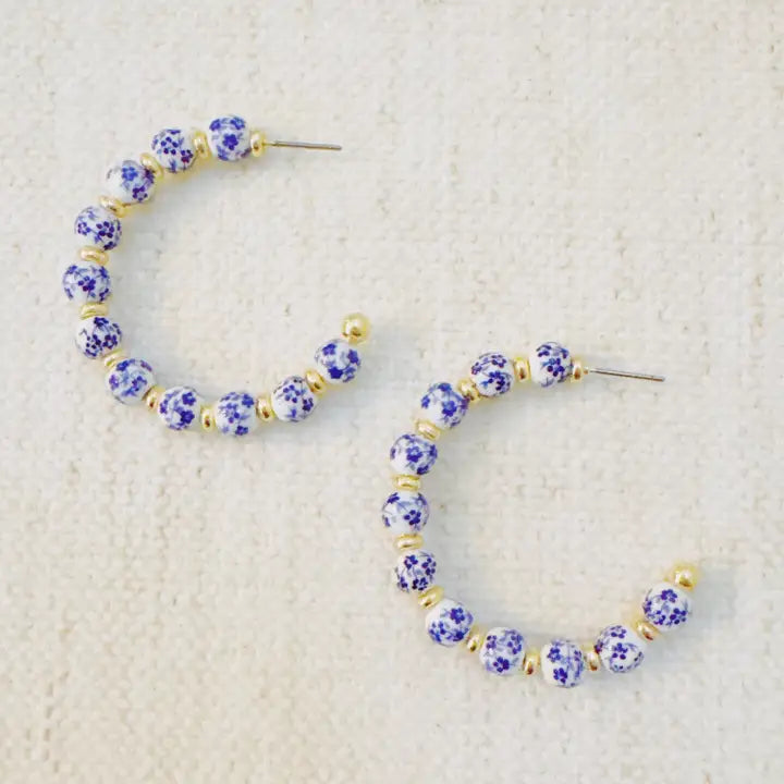 Blue Bloom Floral Hoop Earrings – Elegant Hoops with Soft Blue Flower Accents