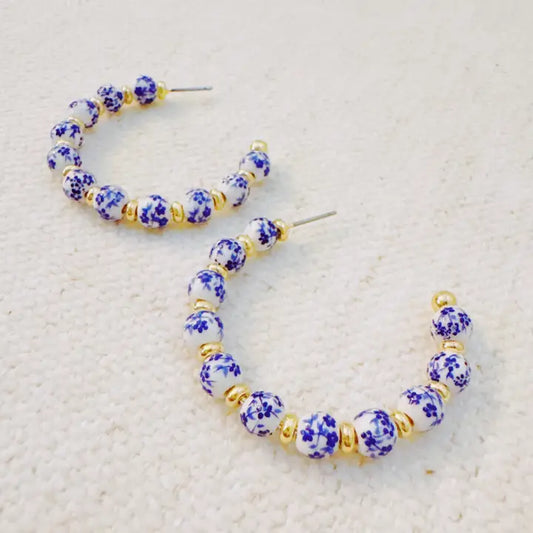 Blue Bloom Floral Hoop Earrings – Elegant Hoops with Soft Blue Flower Accents